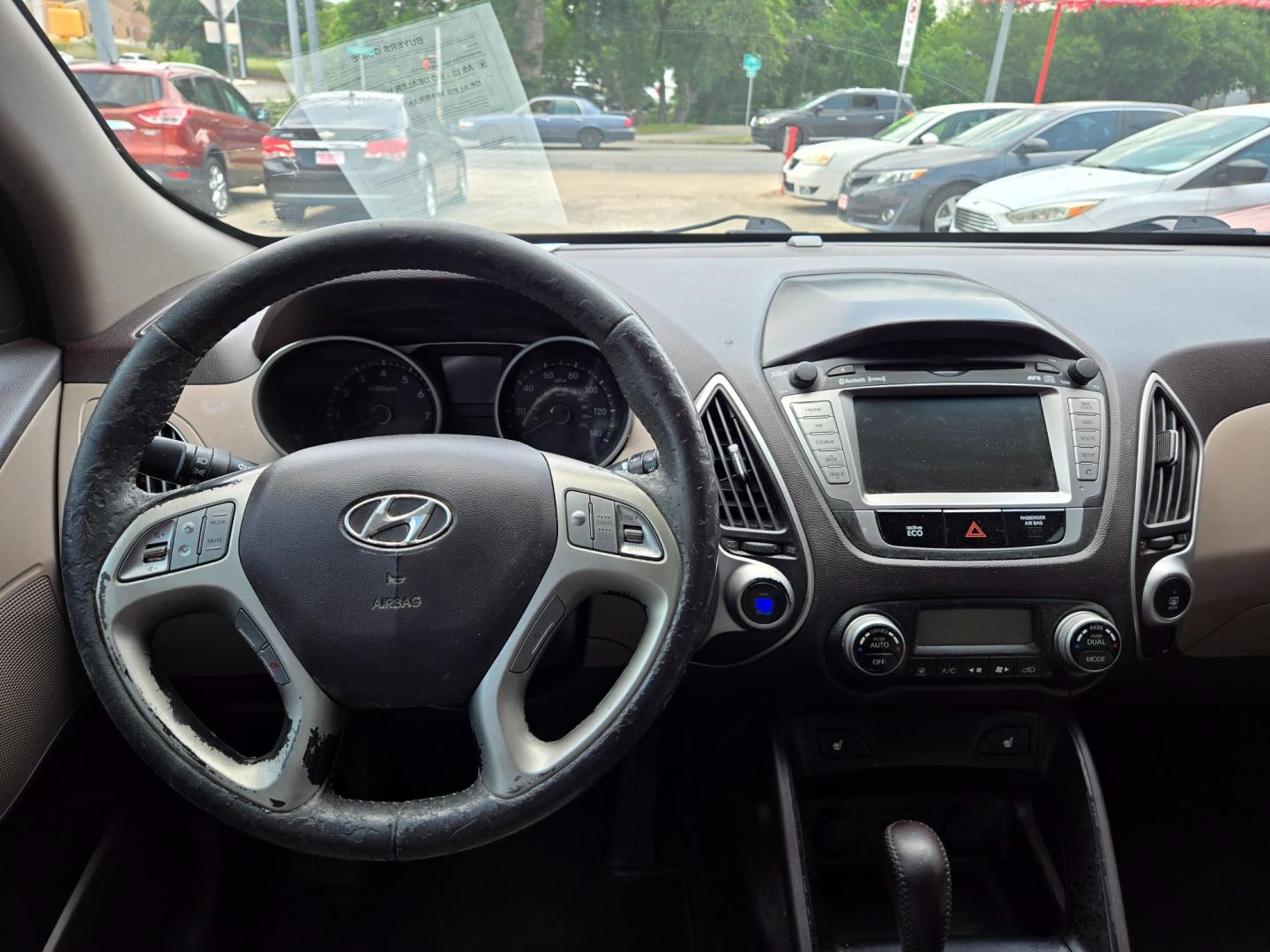 2013 Blue Hyundai Tucson Limited 2WD (KM8JU3AC4DU) with an 2.4L L4 DOHC 16V engine, 6-Speed Automatic transmission, located at 503 West Court, Seguin, TX, 78155, (830) 379-3373, 29.568621, -97.969803 - Photo#5